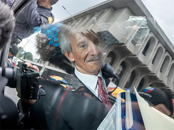 Newspaper founder and editor José Rubén Zamora is taken in a patrol car back to prison after a court hearing in Guatemala City, Wednesday, June 14, 2023. A tribunal has convicted Zamora and sentenced him to six years in prison in a money laundering case. (AP Photo/Santiago Billy)